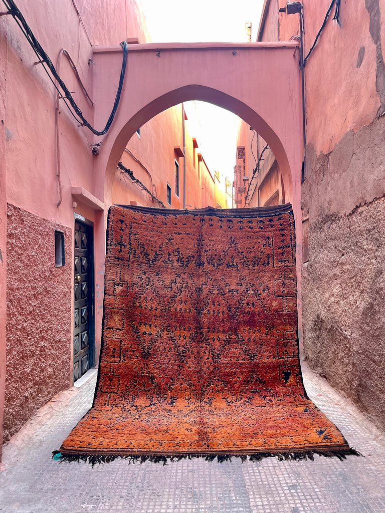 A beautiful Moroccan rug  with traditional tribal patterns.