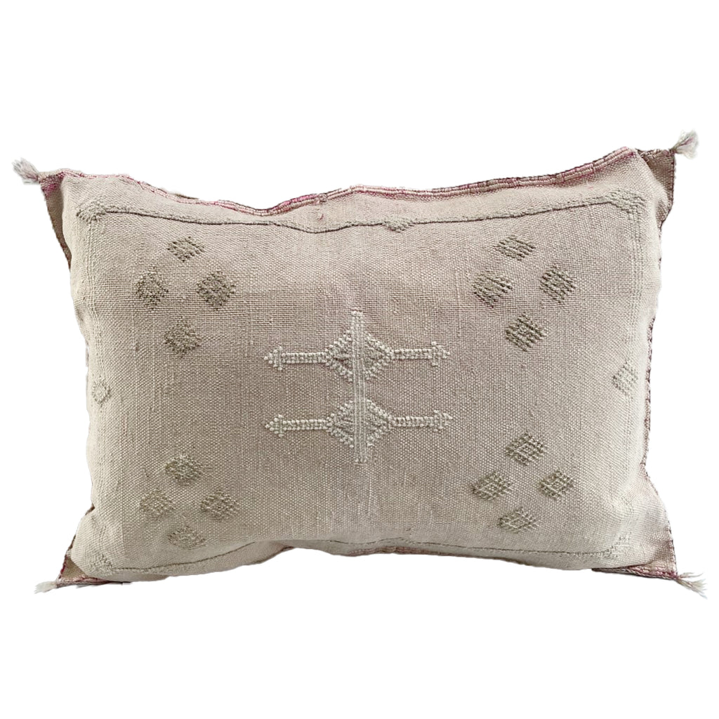 The allure of cactus silk rugs with cactussilk cushion from Moroccan Tribe's exclusive collection.