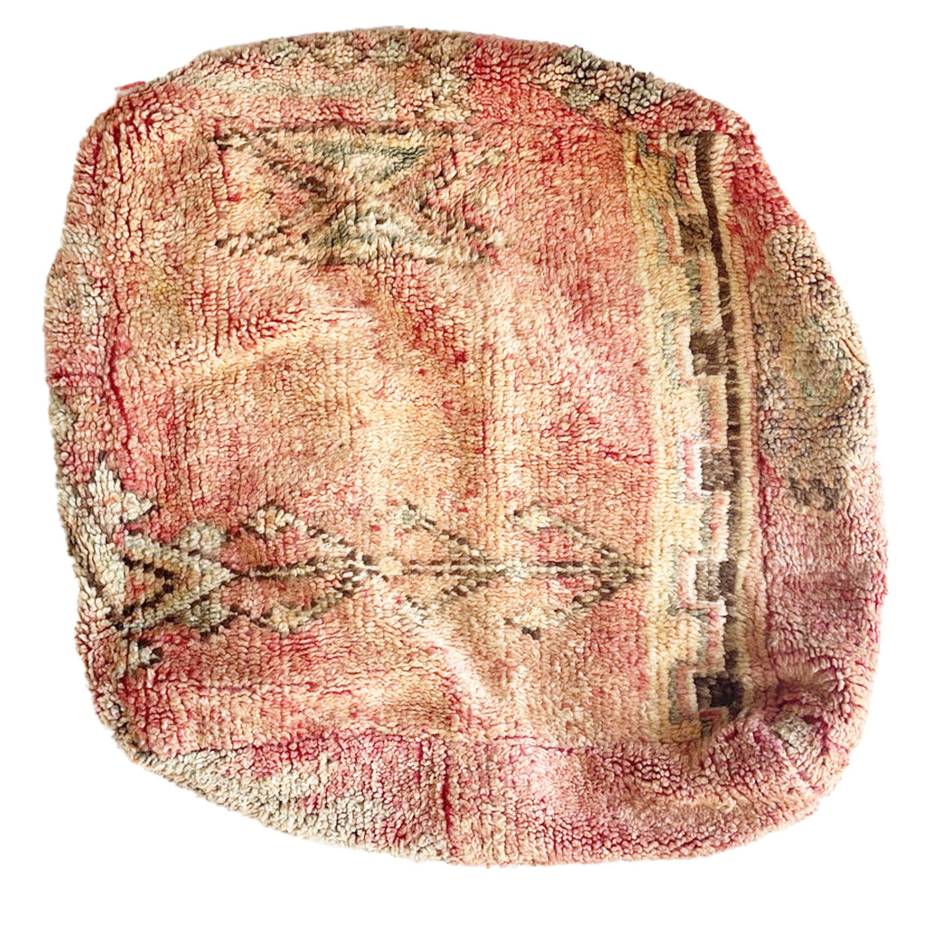 Floor cushion with unique tribal patterns, perfect for Moroccan-inspired decor.