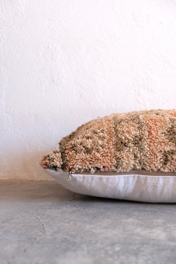 Vintage Moroccan boujaad cushion showcasing unique designs and adding a touch of Morocco to your decor.