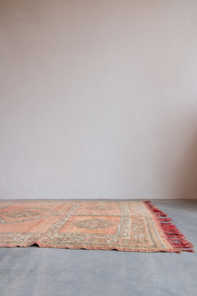 The vintage Moroccan rug a true gem from Moroccan Tribe's exquisite collection.