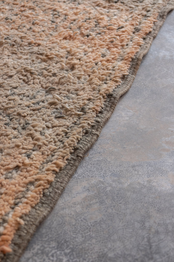 Vintage Moroccan rug with intricate motifs and contemporary designs.