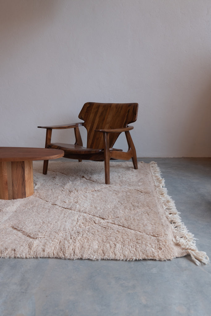 Contemporary Moroccan rug displaying tribal-inspired patterns and earthy tones. handmade in Morocco