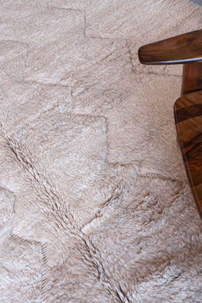 Contemporary Moroccan rug hadmade using 100% organic wool in neutral tones.