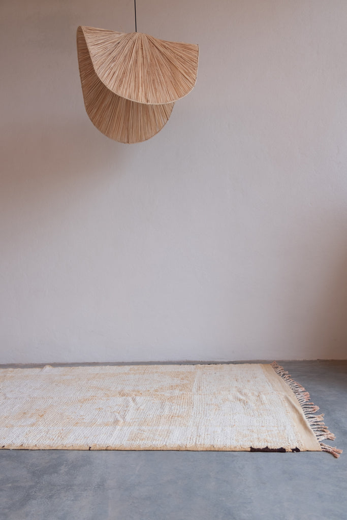 Vintage Moroccan rug  featuring neutral colors and contemporary tribal patterns. summer rug