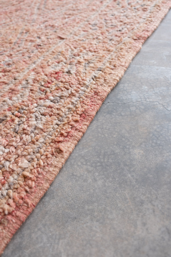 The allure of the vintage Moroccan rug  a true masterpiece from Moroccan Tribe's collection.