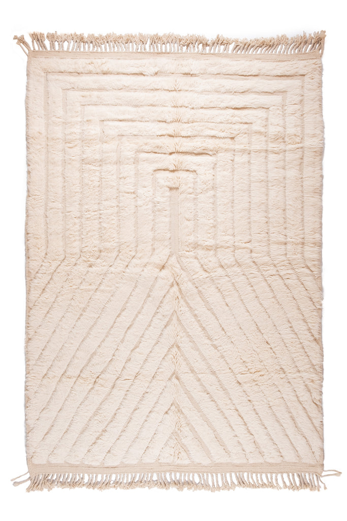 New handmade cream Moroccan rug showcasing traditional Berber motifs and contemporary elements.