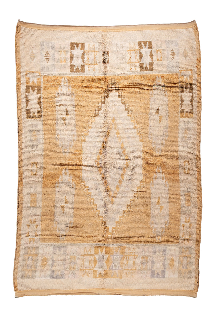 Moroccan Tribe offers a vintage Moroccan rug , showcasing intricate tribal patterns and traditional beauty 