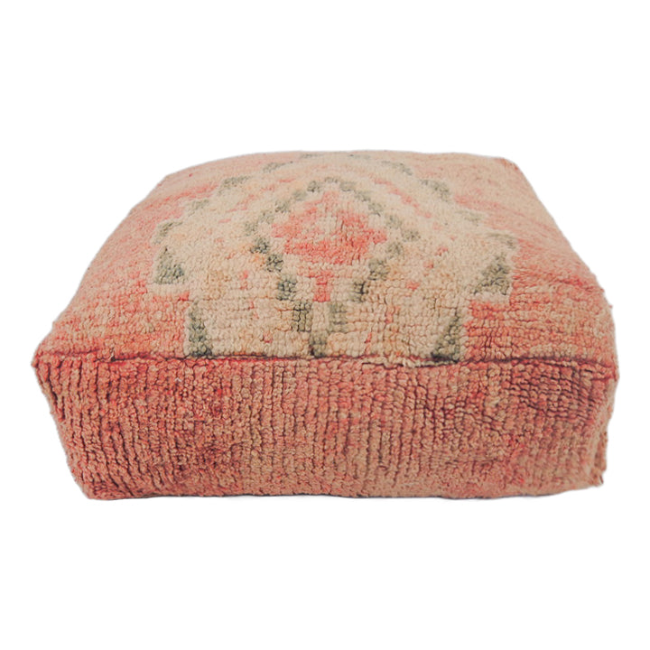 Vintage Moroccan floor cushion in blush with neutral colors, a cozy addition to any space.